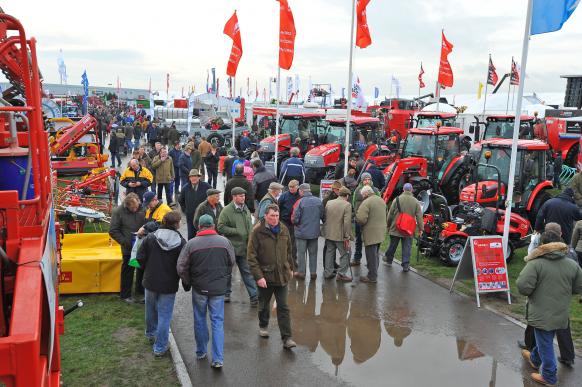 Large groups of visitors at the LAMMA agricultural exhibition showing the various outdoor stands and machinery