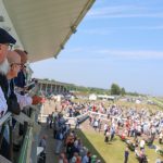 The ATI team watching a race at the Charles Lumsden Memorial race day