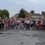 Group of cyclists about to set out on a sponsored ride